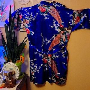 Soft, short and beautifully decorated and colored bathrobe